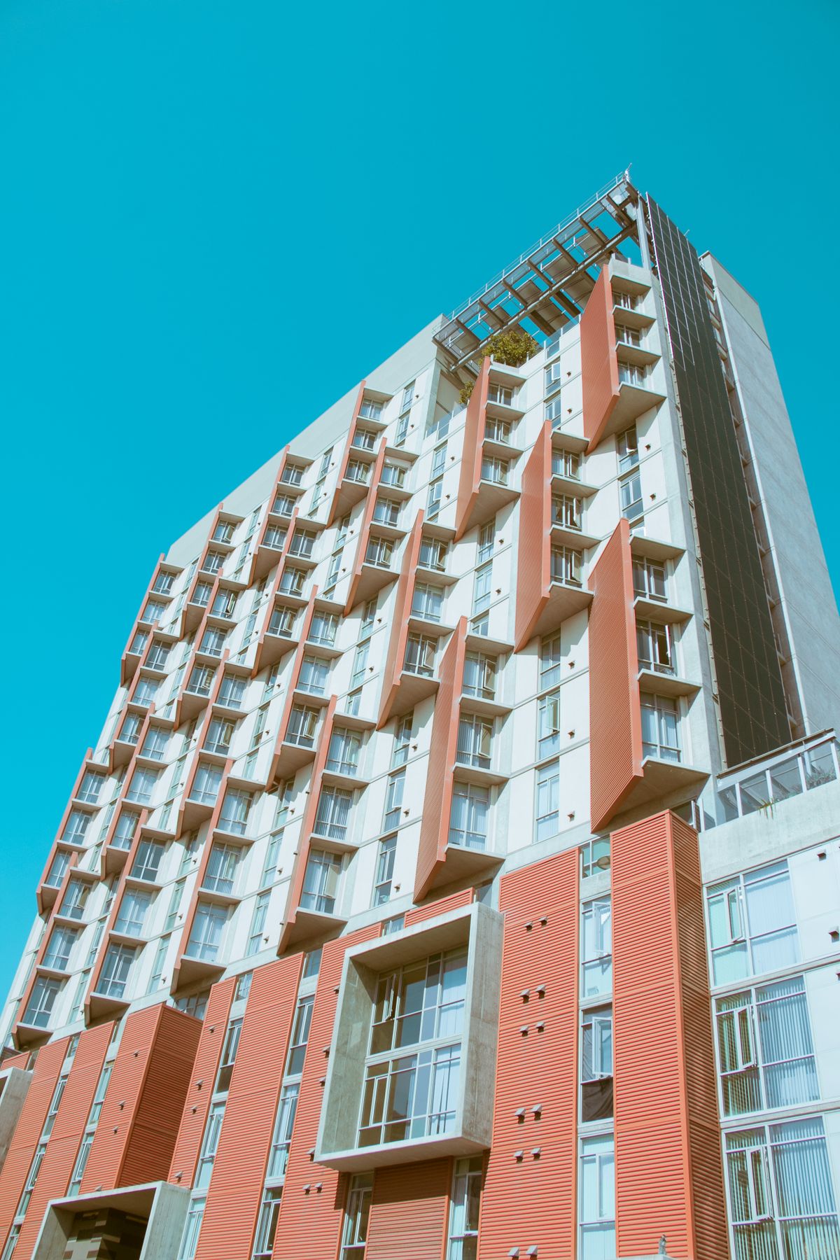 Stylish and contemporary apartment building exterior in San Diego, featuring unique facade design.