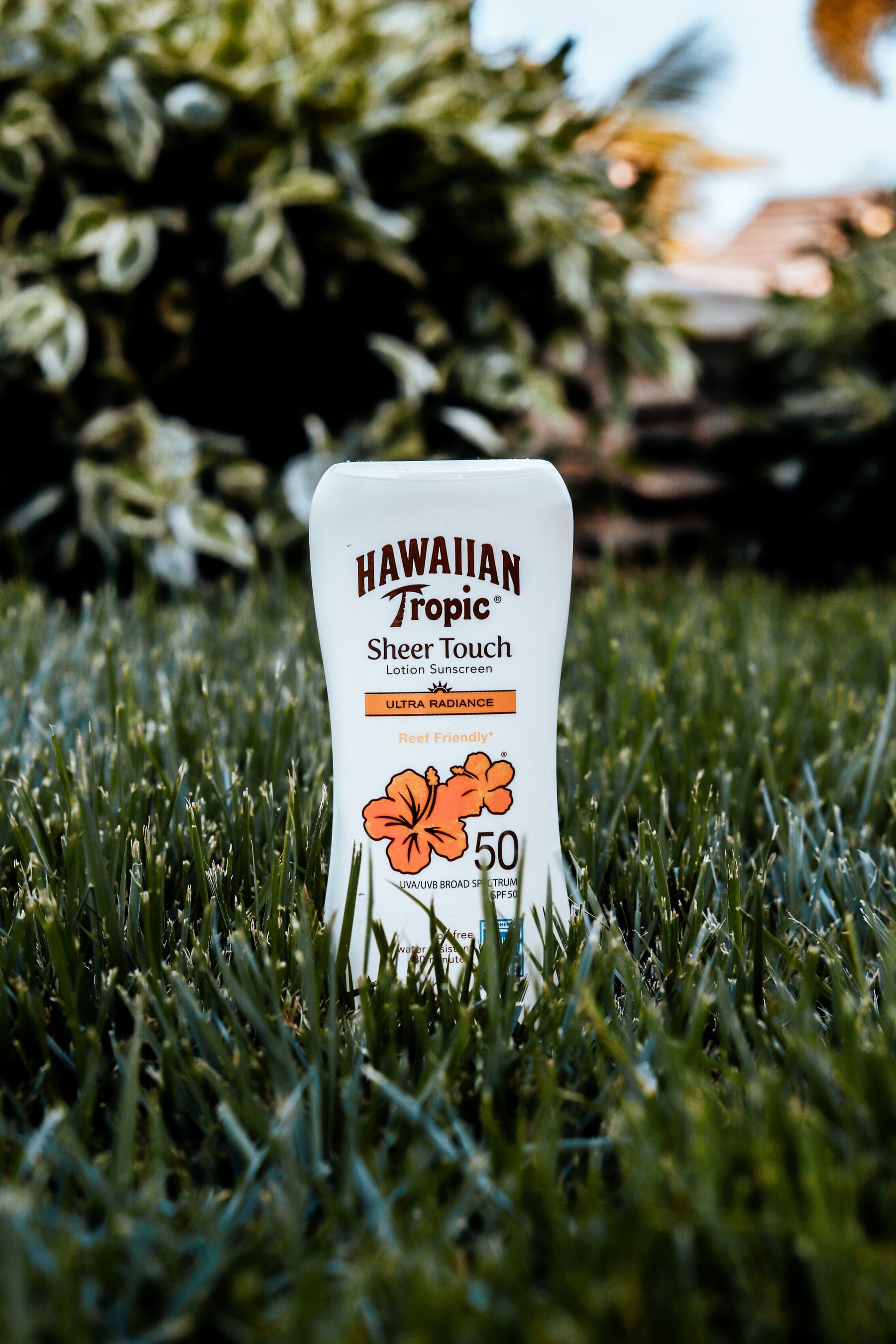 White Hawaiian Tropic sunscreen bottle with SPF50 on its front